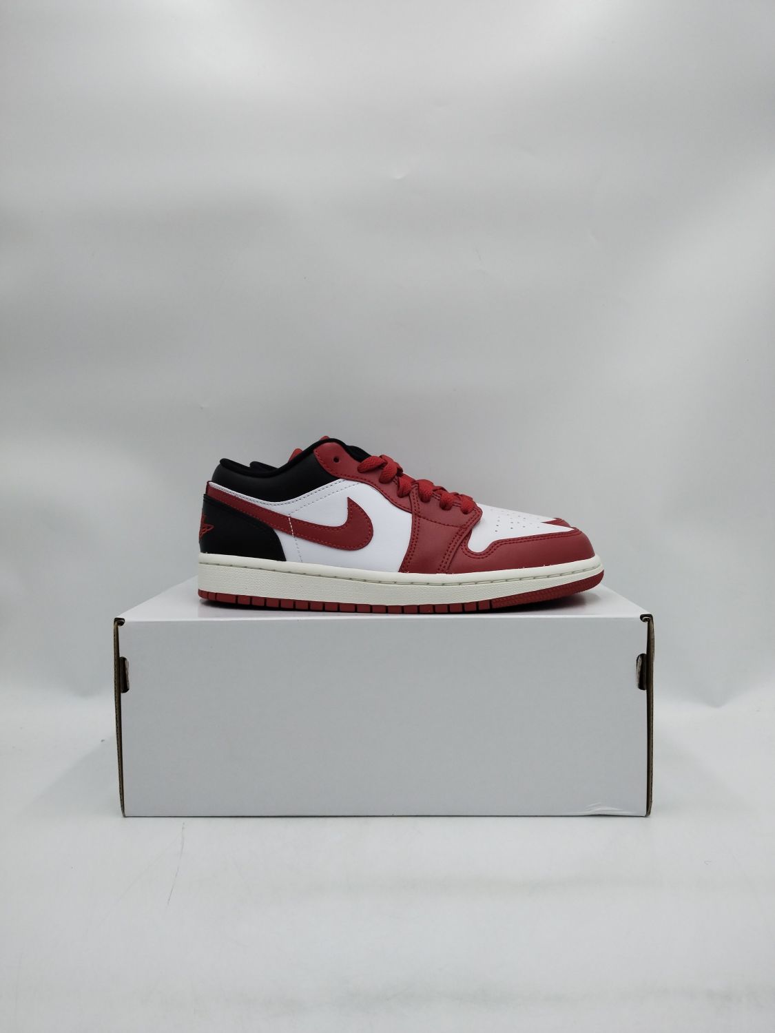 jordan 1 low black toe womens