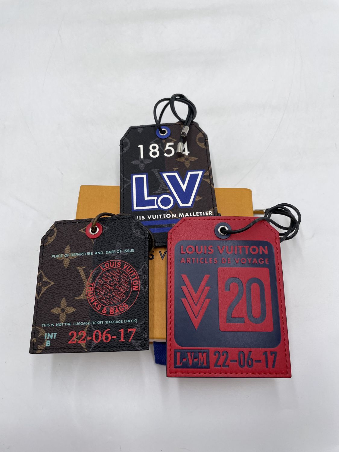 Louis Vuitton Red Leather Luggage Tag - Yoogi's Closet