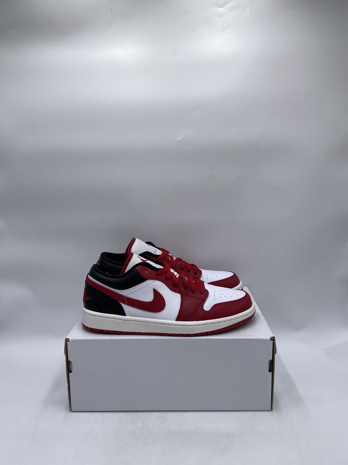 jordan 1 low black toe womens