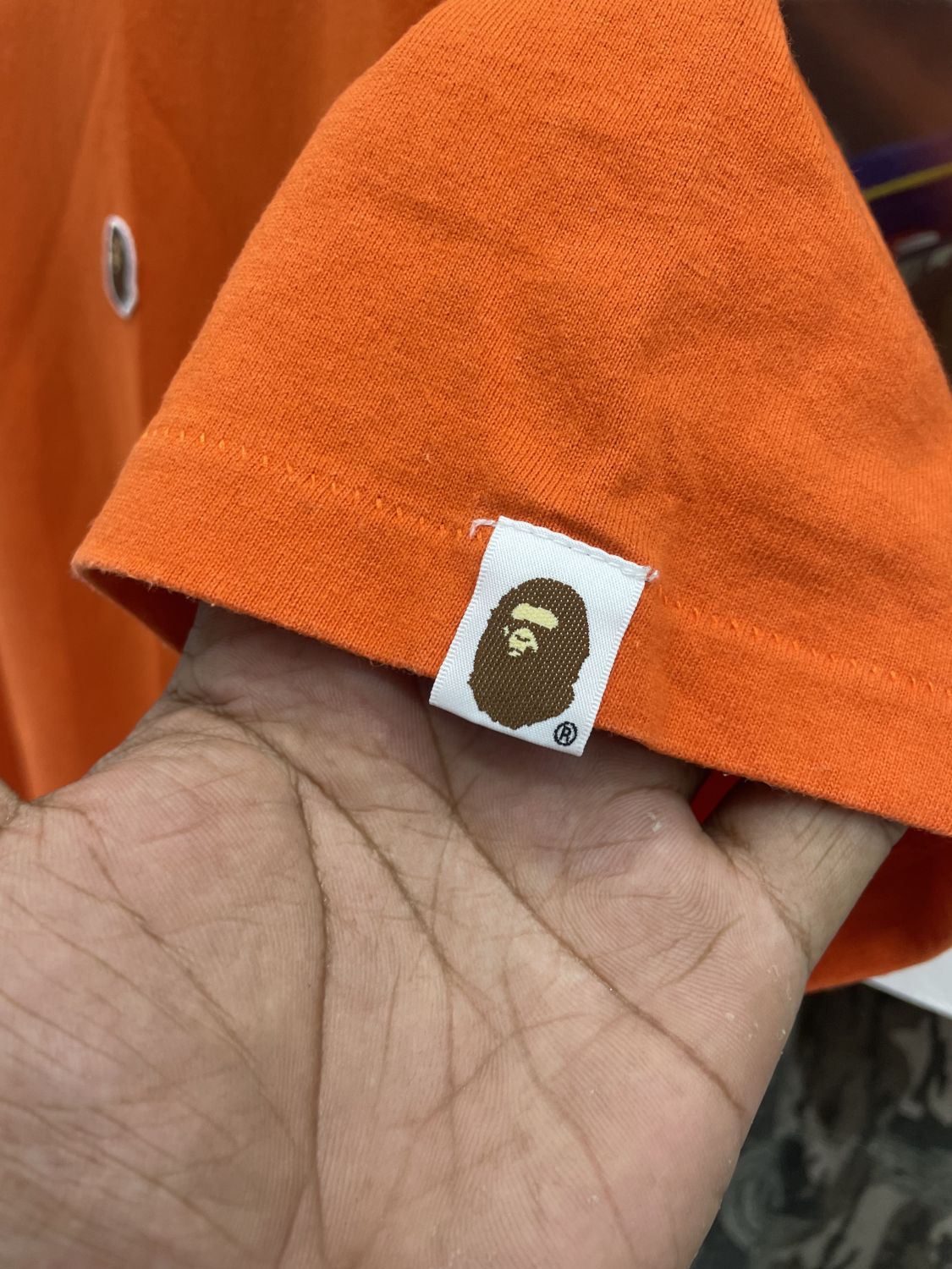 Orange camo bape on sale shirt