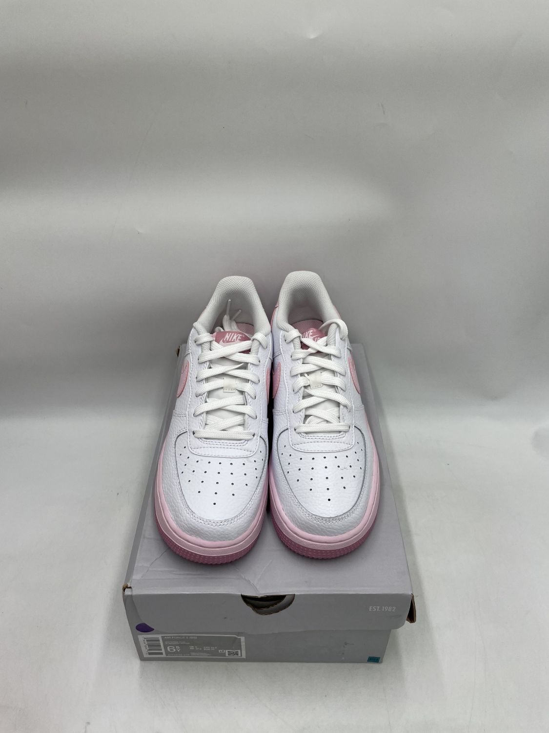 White air forces hot sale with pink bottoms