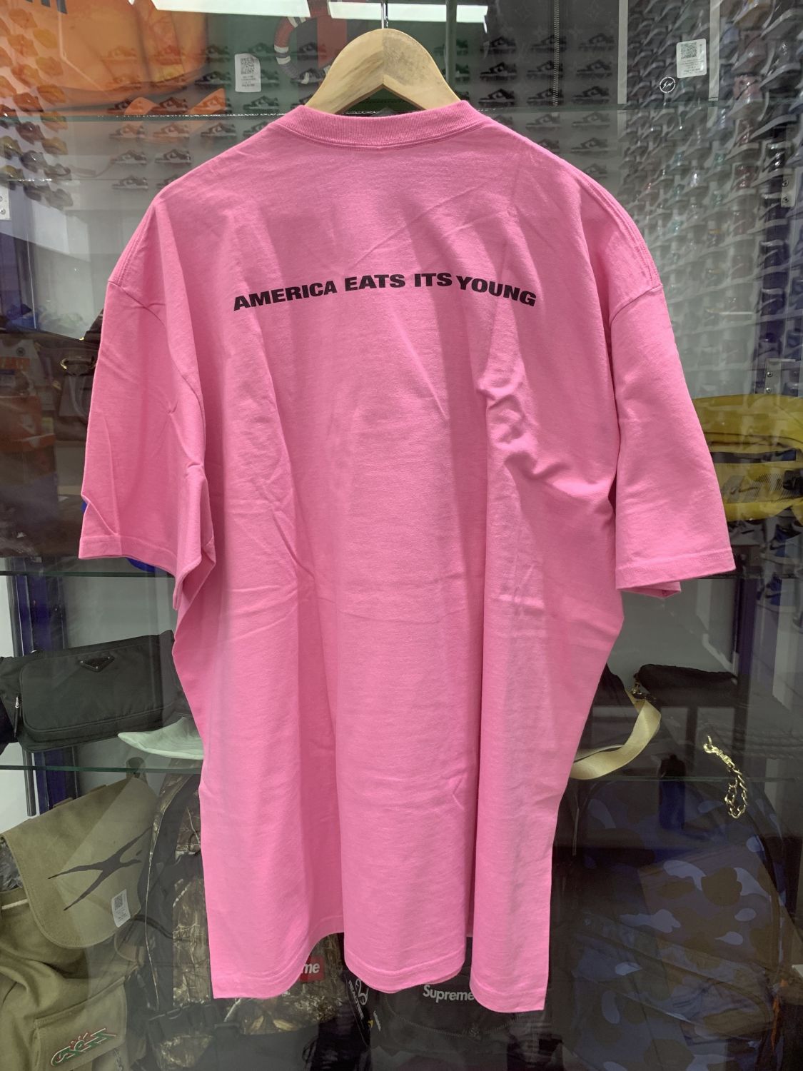Supreme America Eats Its Young Pink Tee | AfterMarket