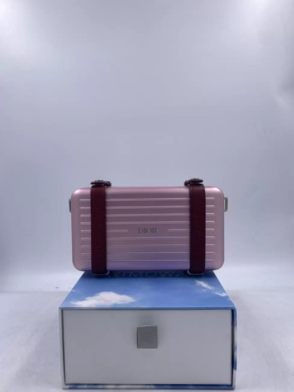 Dior rimowa clutch discount price