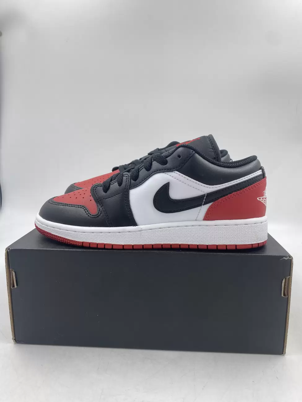 Jordan 1 Low Bred Toe 2.0 (GS) | AfterMarket