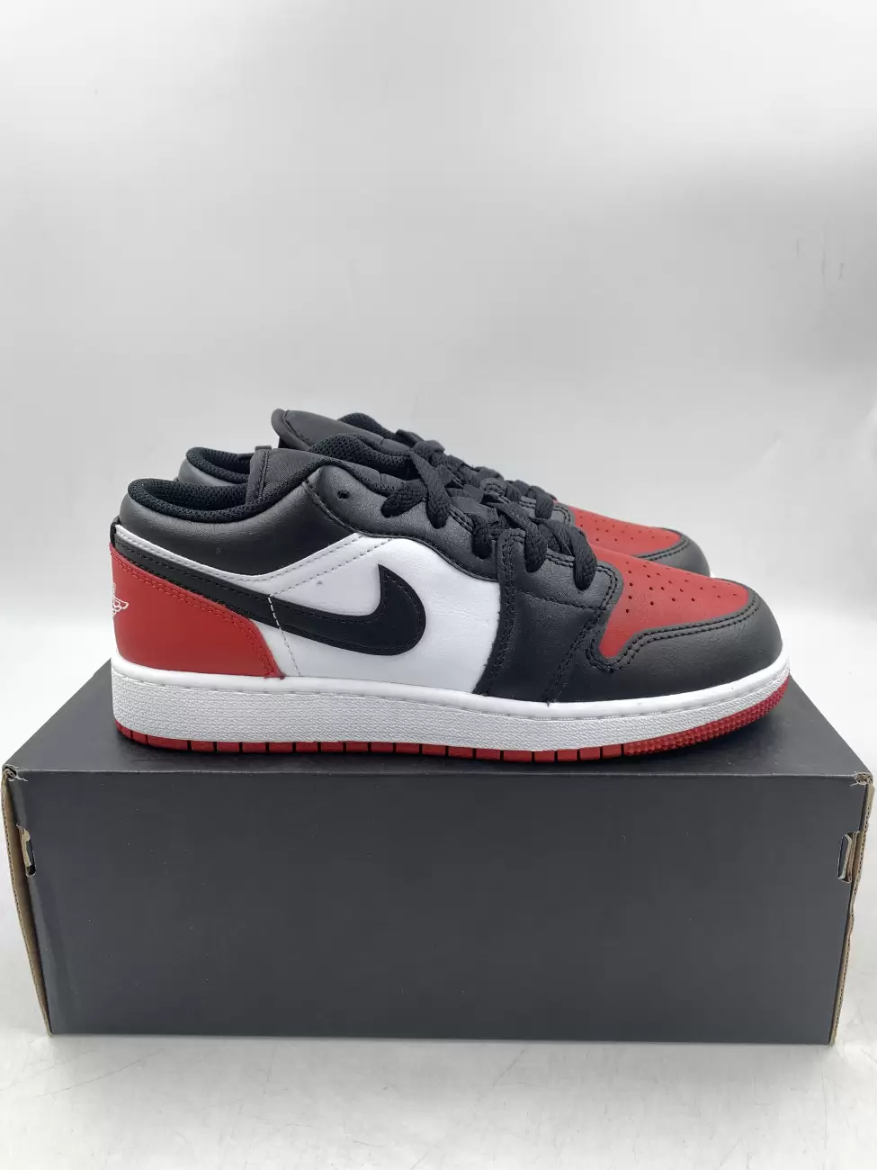 Jordan 1 Low Bred Toe 2.0 (GS) | AfterMarket