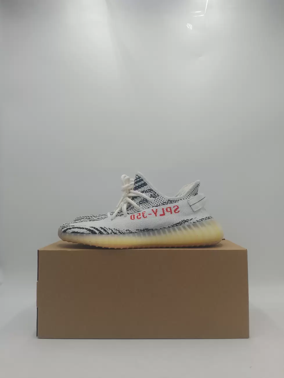 Zebra best sale yeezy sizing