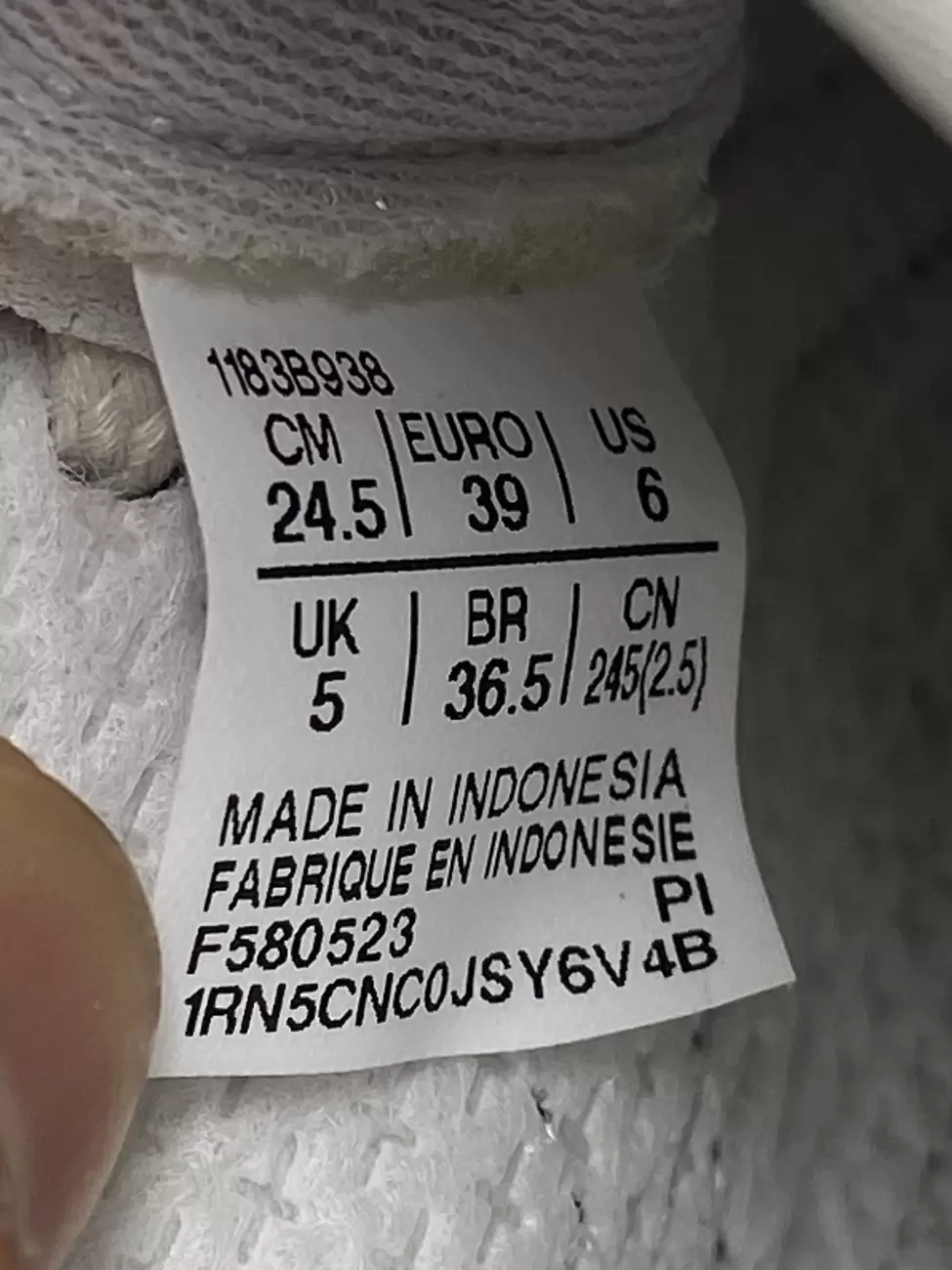 Tag size onitsuka tiger top