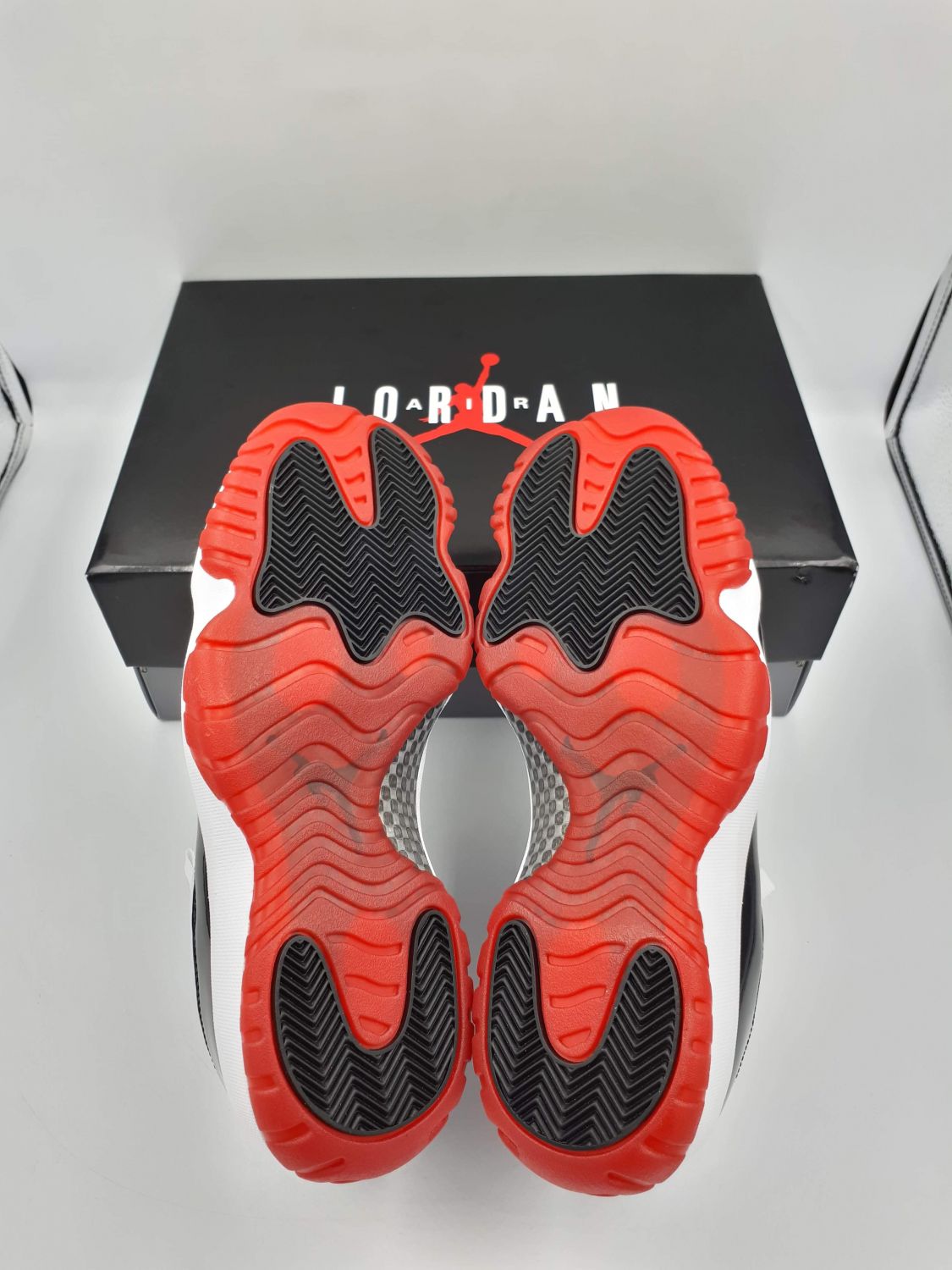 Jordan 11 sale bred bottom