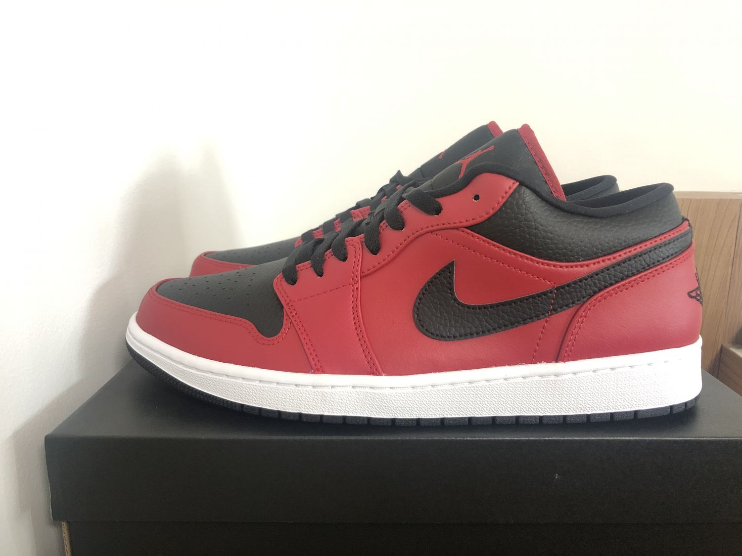 Jordan 1 Low Reverse Bred Pebbled Swoosh Aftermarket