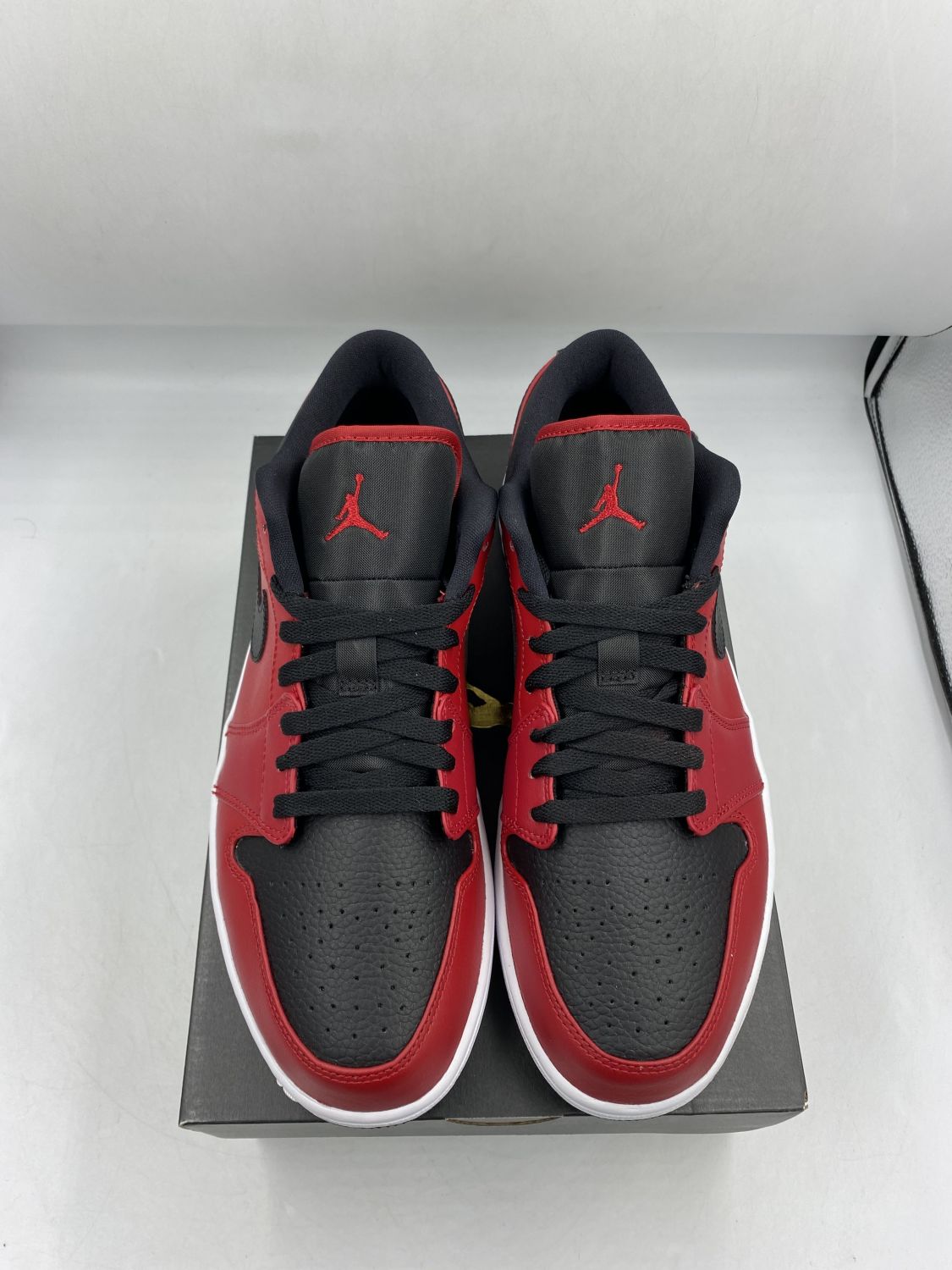 Jordan 1 Low Reverse Bred Pebbeled Swoosh | AfterMarket