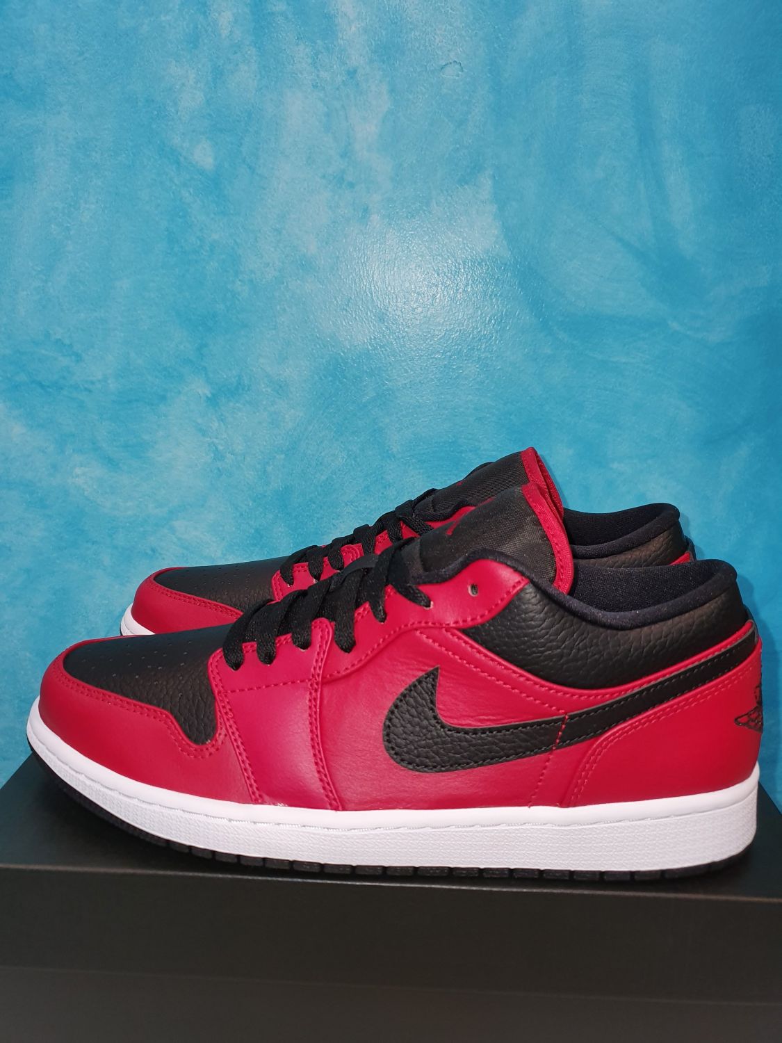 Jordan 1 Low Reverse Bred Pebbled Swoosh Aftermarket