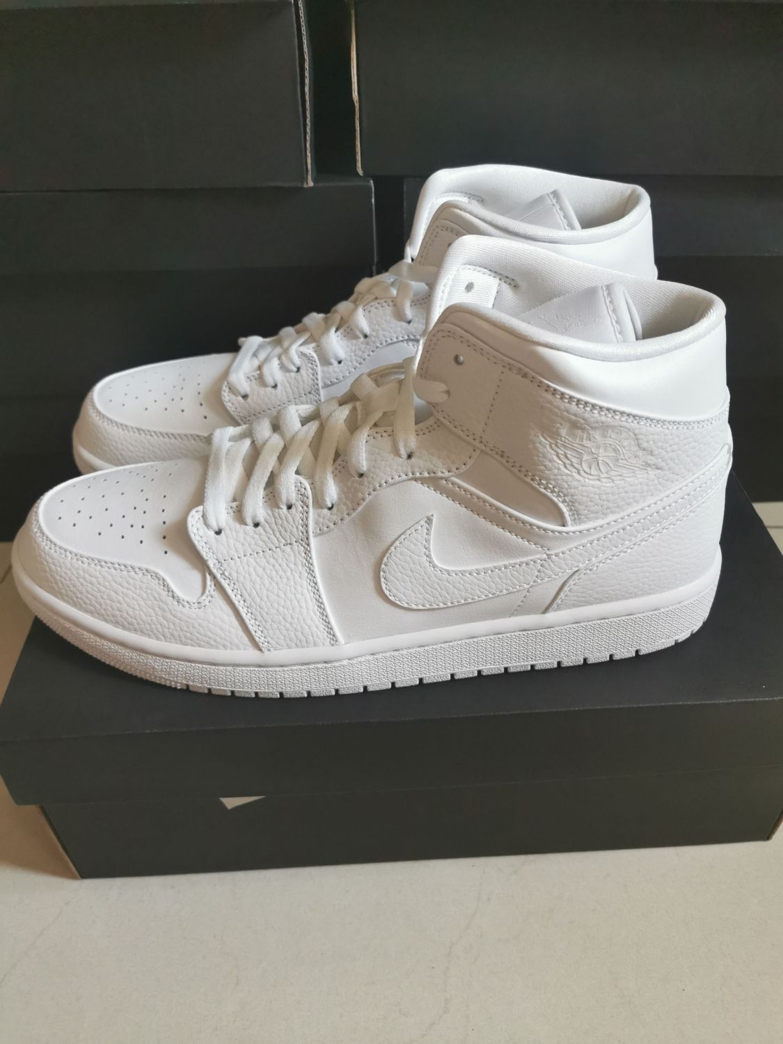 Jordan 1 triple white on sale price