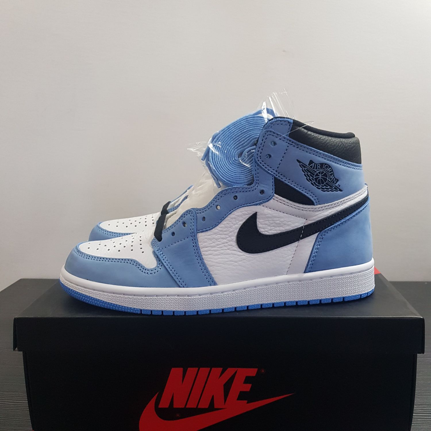 Jordan 1 Retro High White University Blue Black | AfterMarket