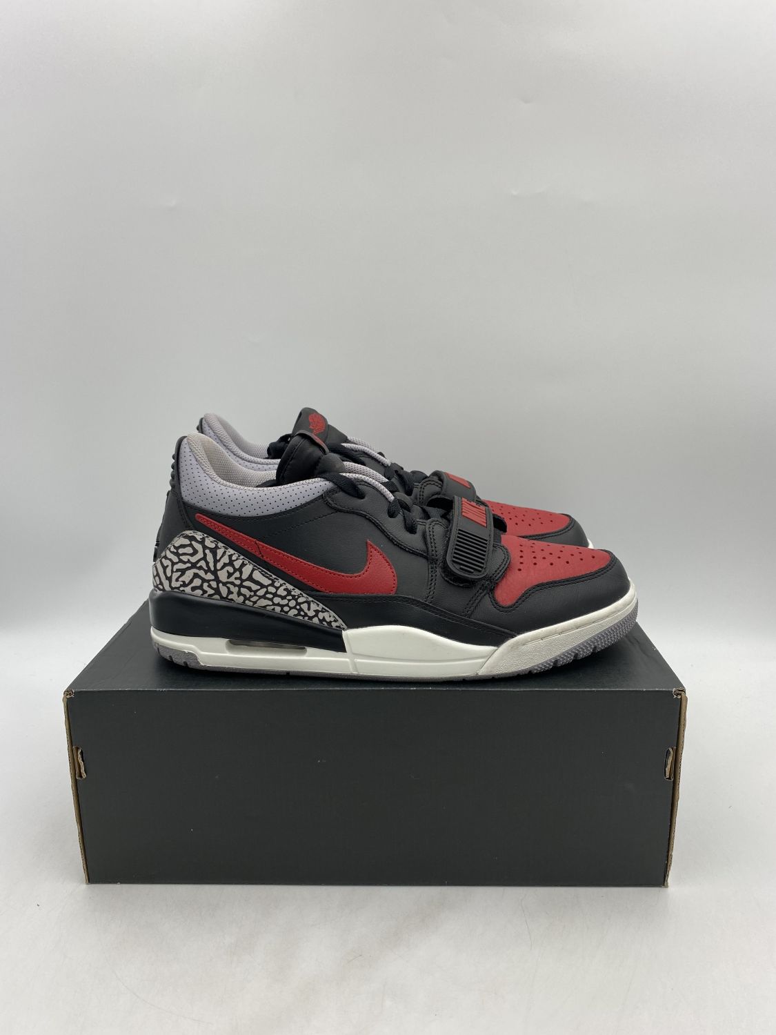 Jordan legacy 312 low hot sale bred cement release date