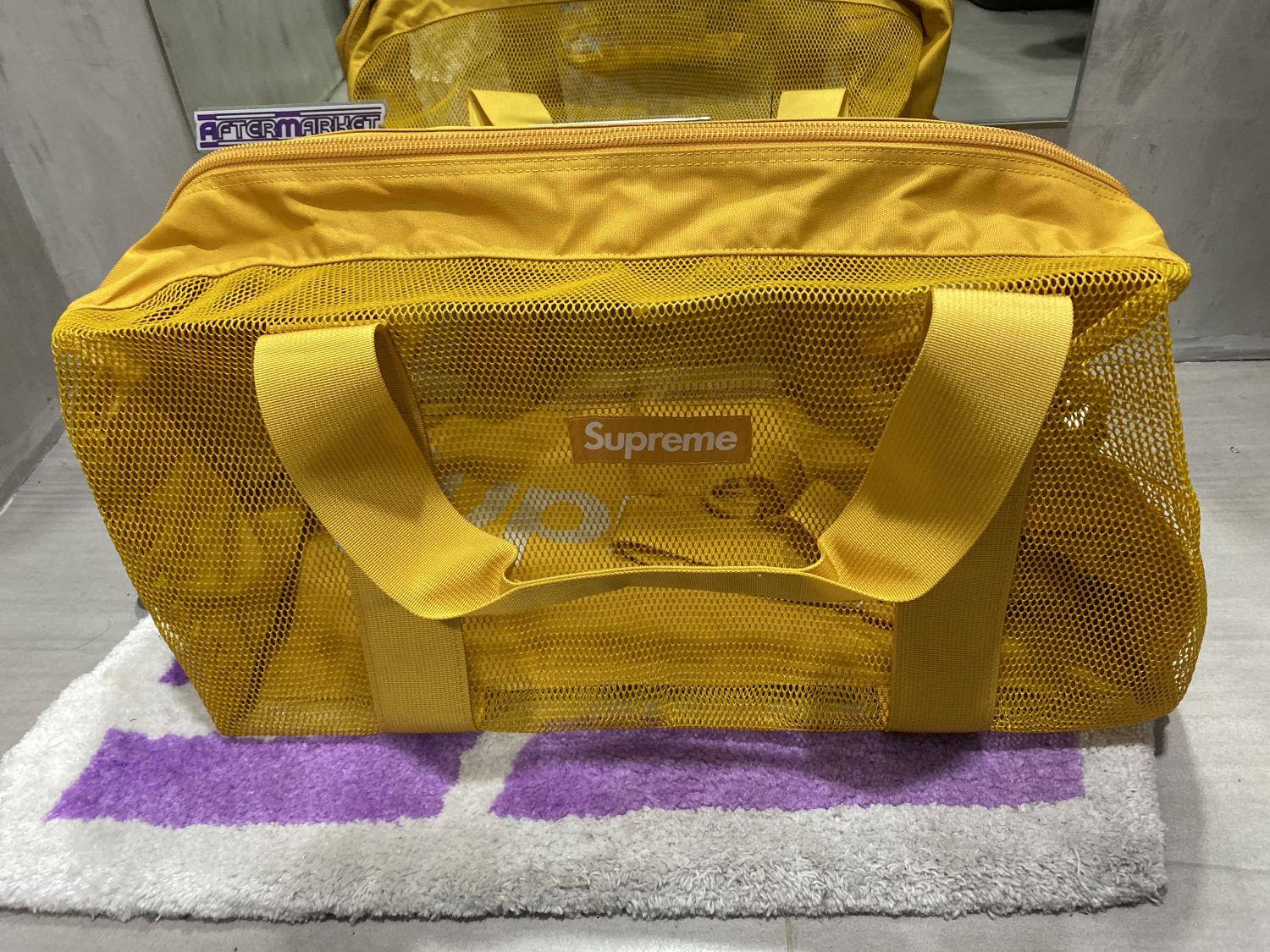 Yellow supreme duffle bag sale