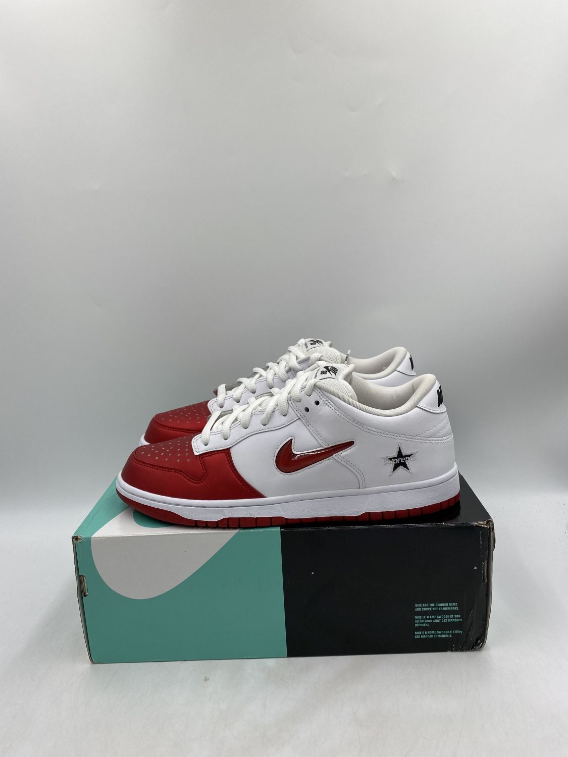 Nike SB Dunk Low Supreme Jewel Swoosh Red | AfterMarket